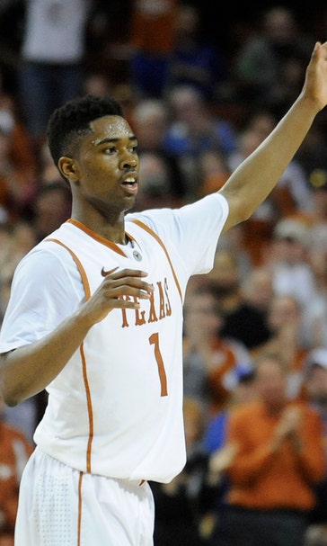 Holmes powers No. 25 Texas over No. 6 Kansas 81-69